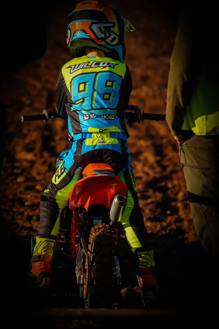 Henry Wilcox from behind at the gate, WILCOX 98 on the jersey