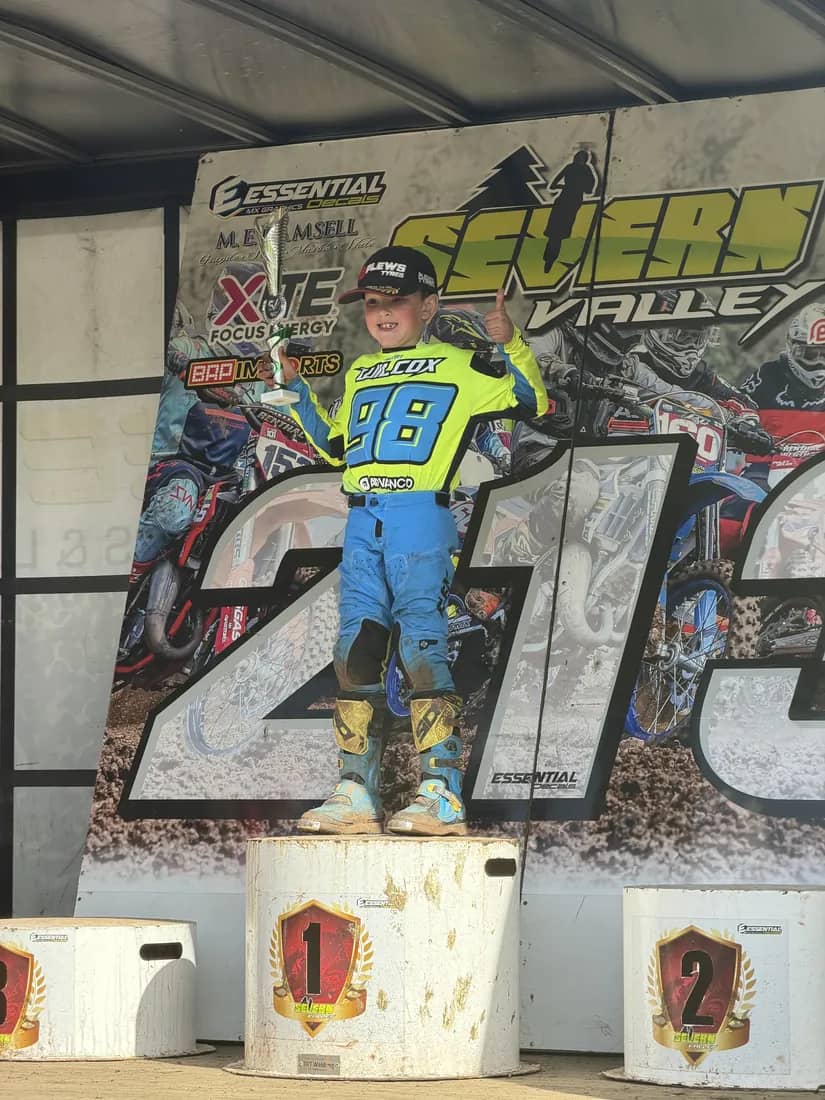 Henry Wilcox on the top step of the podium at Severn Valley in his #98 kit