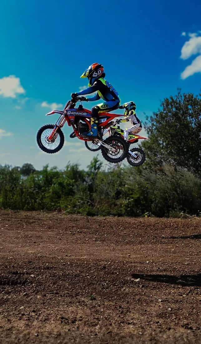 Henry Wilcox throwing a whip high against the sun